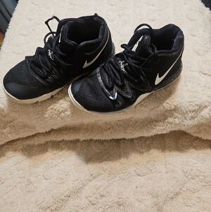 Nike Black High-Top Basketball Sneakers with White Swoosh